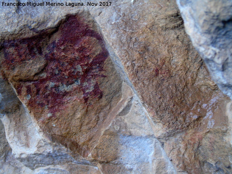 Pinturas rupestres de la Cueva de la Graja-Grupo XIII - Pinturas rupestres de la Cueva de la Graja-Grupo XIII. Figura a la derecha de la escena de domesticacin