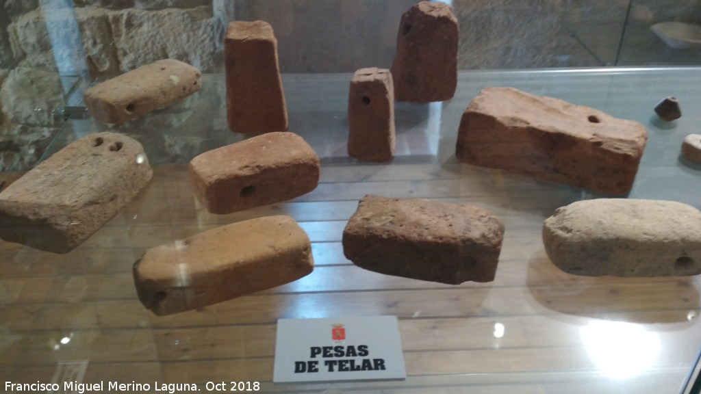 Historia de Castellar - Historia de Castellar. Pesas de telar. Museo de la Colegiata