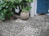 Palacio de Viana. Patio de las Rejas. Suelo y bala