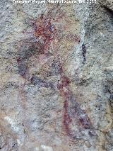 Pinturas rupestres de la Cueva de la Graja-Grupo XIII. Antropomorfo tipo phi con dos piernas y decorada su cabeza con finas lneas verticales a modo de corona de plumas