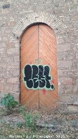 Torre de Perdigones de la Cruz. Puerta restaurada por la Escuela Taller