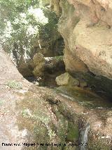 Cascada del Molinete. Paso hacia la cascada