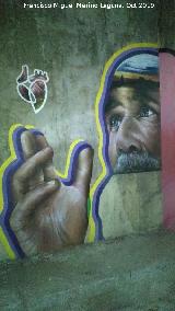 Graffiti de la Esposa del Minero y el Minero de la Cruz. 