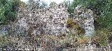 Villa Medieval. Resto de vivienda con mechinales