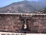 Puerta de la Villa. Vista la carretera desde una saetera de la azotea del Torren