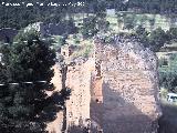 Muralla de Jan. Torren Pentagonal. Marca de la almena en el tapial