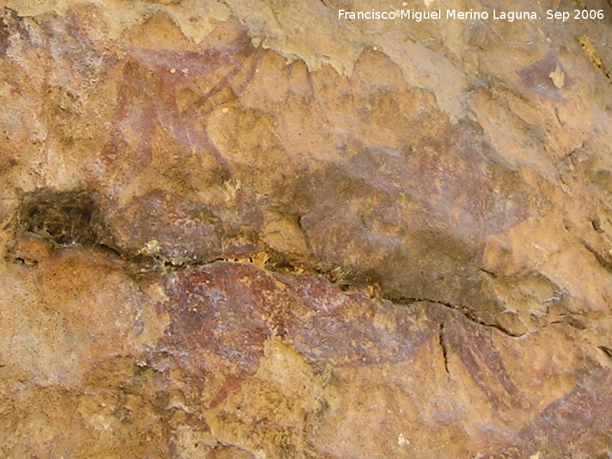 Pinturas rupestres de la Cueva del Engarbo I. Grupo II. Panel VII - Pinturas rupestres de la Cueva del Engarbo I. Grupo II. Panel VII. Antropomorfo clavando algo en los cuartos traseros de un jabal