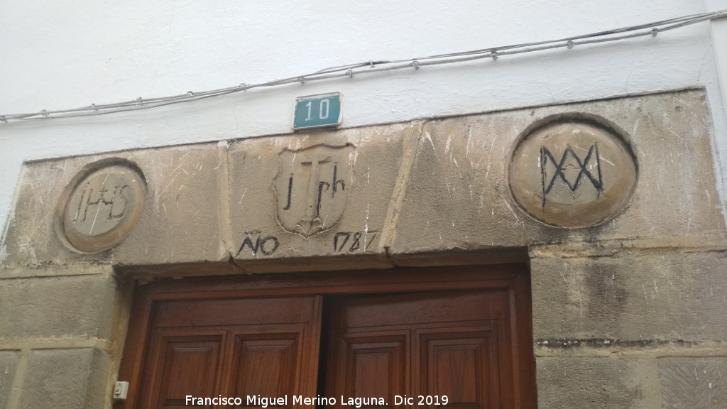 Dintel - Dintel. Calle Moraga - Baeza