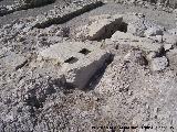 Villa romana del Cortijo de los Robles. Piedra de apoyo de la viga de una prensa