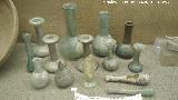 Cstulo. Botellas, ungentarios y ampollas de vidrio. Siglos I-III d.C. Museo Arqueolgico de Linares