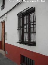 Casa de la Calle Carrera Baja n 2. Reja de rosetas