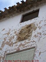 Casa del General Alejandro Utrilla. Alero y escudo