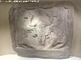 Aldea Mogn. Bajorelieve ibero de divinidad entre caballos. Museo Provincial de Jan