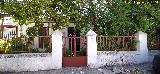 Aldea El Centenillo. Casa t�pica con jard�n delantero