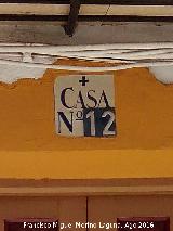 Casa de la Calle Escultor Higueras n 12. Placa de nmero antigua