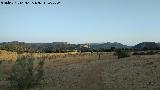 Llanos de Palomares. Con la Piedra del Palo al fondo