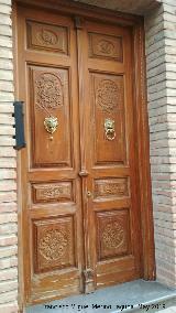 Puerta. Psito de llora