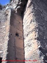 Muralla de Jan. Puerta de la Llana. Marco de la puerta y hueco de la tranca