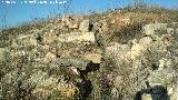Castelln de Caviedes. Restos de muralla