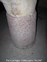 Aljibe Almohade. Pedestal romano con inscripcin