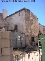 Muralla de Jan. Medianera de una casa. 